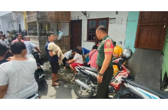 Acara program vaksinasi hewan di Gang Tenang, Kelurahan Naga Pita, Kecamatan Siantar Martoba (foto: Pendim 0207/Sml)