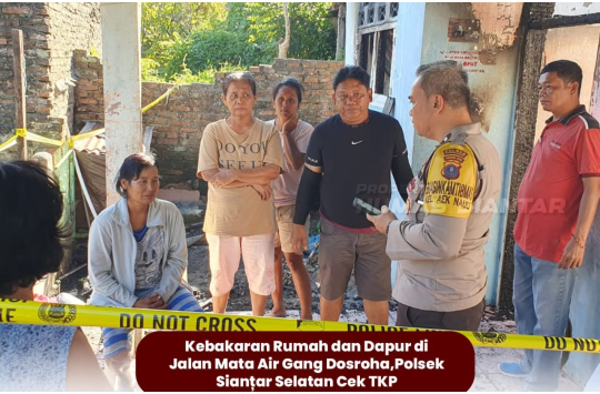 Kapolsek Siantar Selatan IPTU Priston Simbolon saat berada dilokasi kebakaran. (foto: Humas Polressiantar)