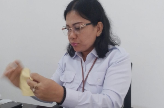 Leonita Siahaan, di kantor Unit Kerja Keimigrasian (UKK) Tarutung. (Foto: Loksa Situmeang/ Kabarnas.com)